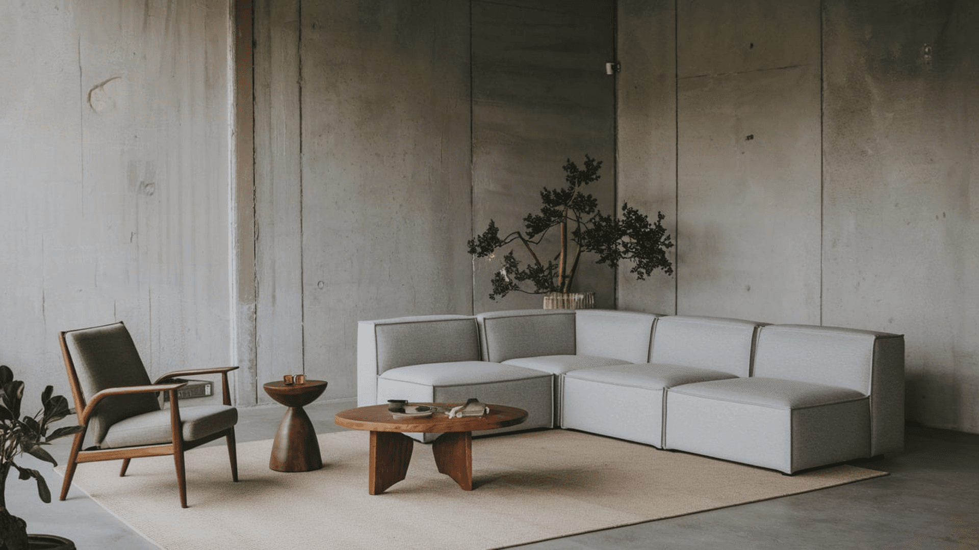 Living room with brown armchair and gray corner sofa